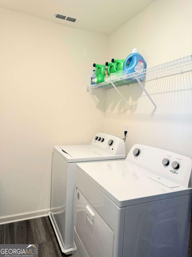 189 Bentwater Way, Hoschton, GA 30548 - washroom featuring independent washer and dryer and dark wood finished floors
