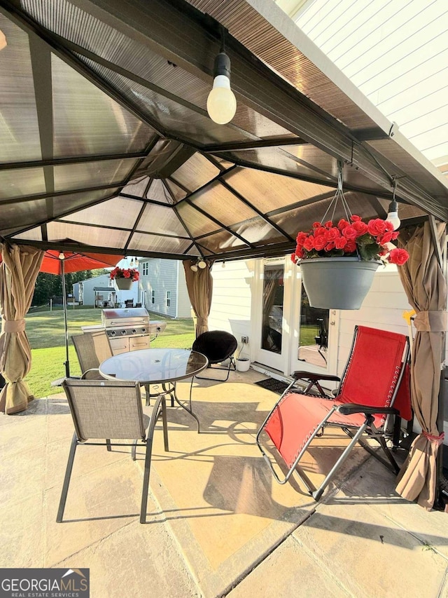 189 Bentwater Way, Hoschton, GA 30548 - view of patio / terrace with a gazebo, grilling area, and outdoor dining area