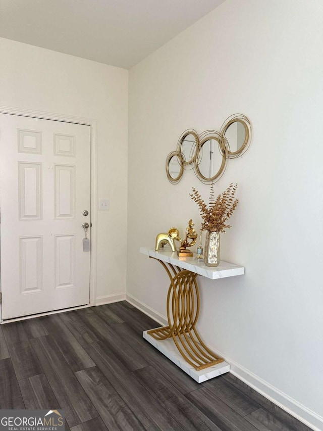 189 Bentwater Way, Hoschton, GA 30548 - foyer entrance with dark wood finished floors and baseboards