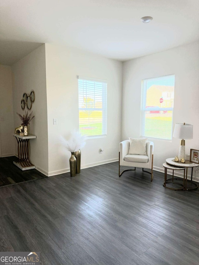 189 Bentwater Way, Hoschton, GA 30548 - sitting room with dark wood-style flooring and healthy amount of natural light