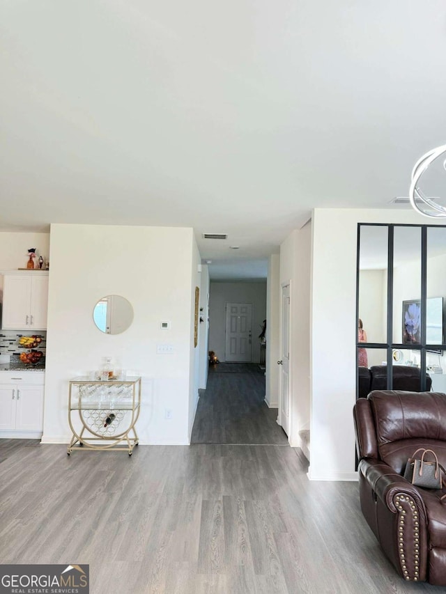 189 Bentwater Way, Hoschton, GA 30548 - living area with wood finished floors and baseboards