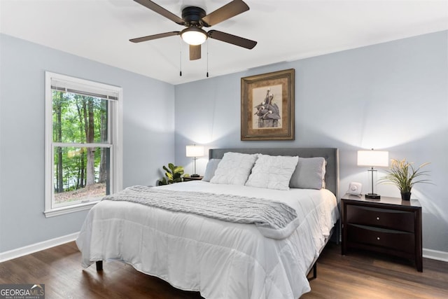 1560 Parks Mill Dr, Greensboro, GA 30642 - bedroom featuring dark wood-style flooring, baseboards, and ceiling fan