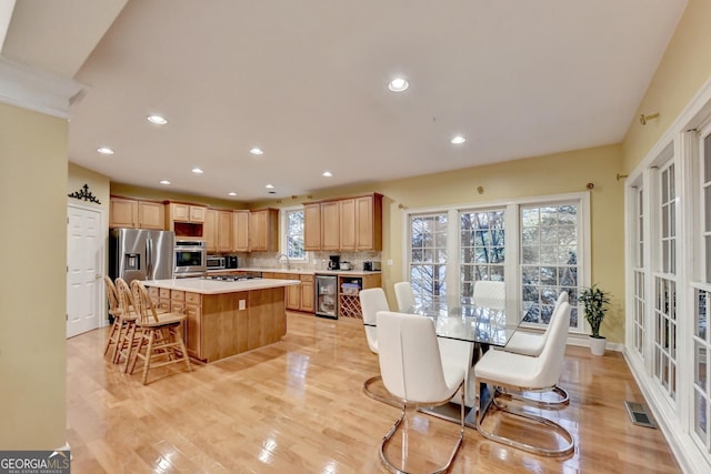 3565 Hickory Branch Trl, Suwanee, GA 30024 - dining space featuring light wood-style flooring and recessed lighting