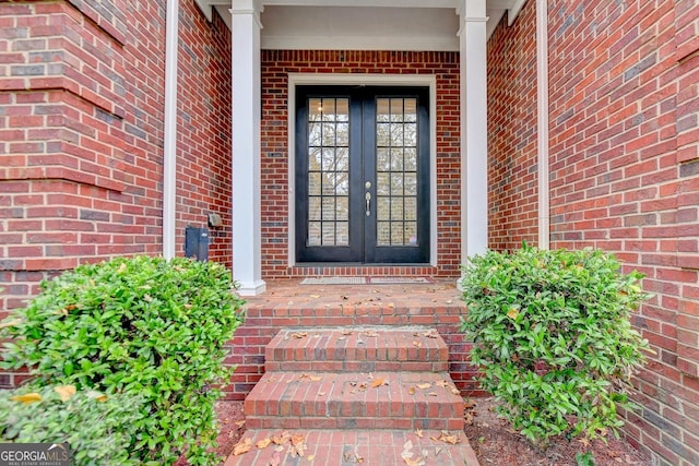3565 Hickory Branch Trl, Suwanee, GA 30024 - property entrance with french doors and brick siding