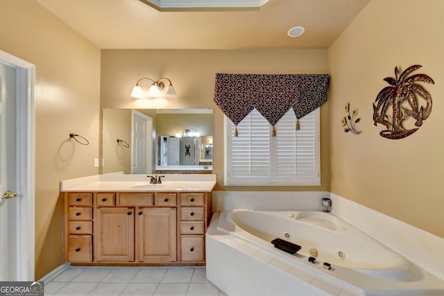 3565 Hickory Branch Trl, Suwanee, GA 30024 - bathroom featuring a tub with jets, vanity, and tile patterned flooring