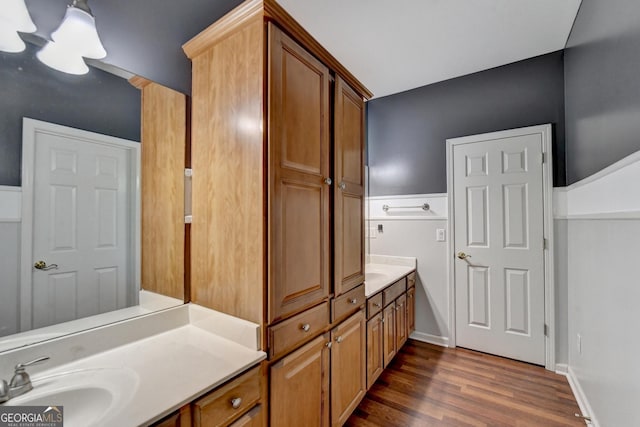 3565 Hickory Branch Trl, Suwanee, GA 30024 - bathroom featuring wood finished floors and vanity