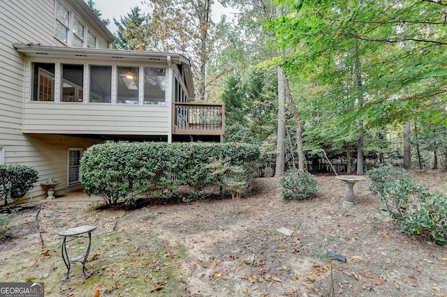 3565 Hickory Branch Trl, Suwanee, GA 30024 - view of property exterior with a sunroom