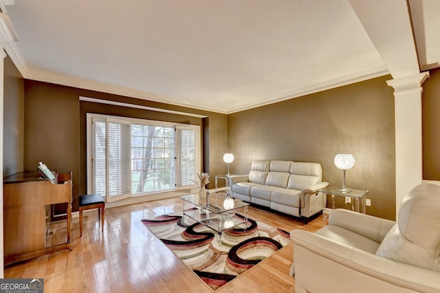 3565 Hickory Branch Trl, Suwanee, GA 30024 - living area with ornate columns, hardwood / wood-style flooring, and ornamental molding