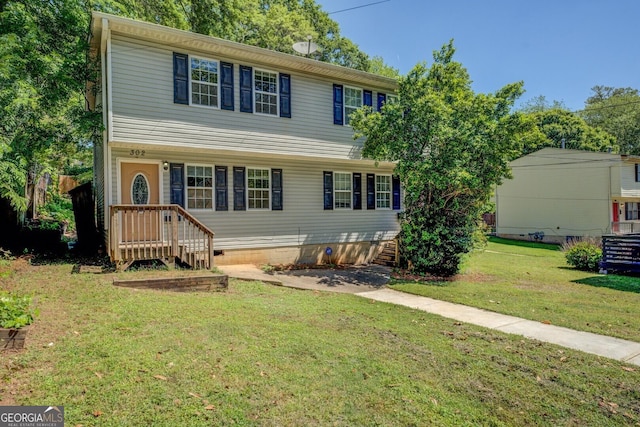 302 Atlanta Ave SE, Atlanta, GA 30315 - view of front of home featuring a front yard, crawl space, and central AC