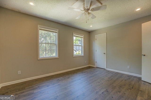 302 Atlanta Ave SE, Atlanta, GA 30315 - unfurnished room featuring wood finished floors, ceiling fan, a textured ceiling, baseboards, and recessed lighting