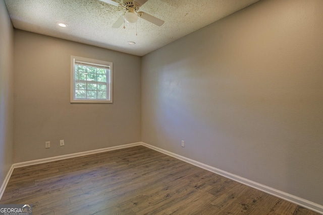 302 Atlanta Ave SE, Atlanta, GA 30315 - empty room with dark wood-style floors, baseboards, a ceiling fan, and a textured ceiling