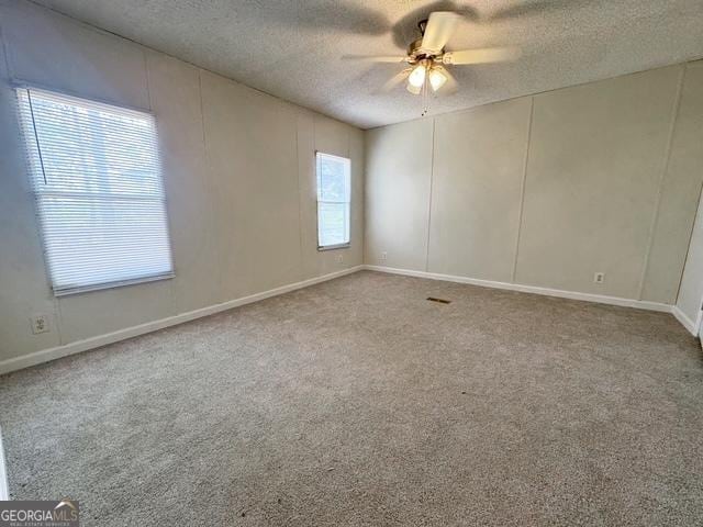 140 Holiday Rd, Franklin, GA 30217 - unfurnished room featuring a textured ceiling, a ceiling fan, and carpet
