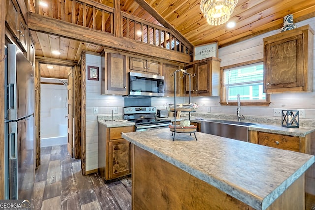 4960 Laurel Ldg, Clarkesville, GA 30523 - kitchen featuring stainless steel appliances, wood ceiling, a sink, brown cabinetry, and dark wood-type flooring