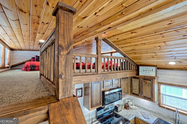 4960 Laurel Ldg, Clarkesville, GA 30523 - unfurnished living room featuring wooden ceiling, vaulted ceiling, a sink, and wood walls