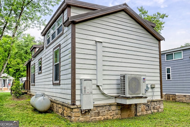 4960 Laurel Ldg, Clarkesville, GA 30523 - view of side of home with a cooling unit and a lawn