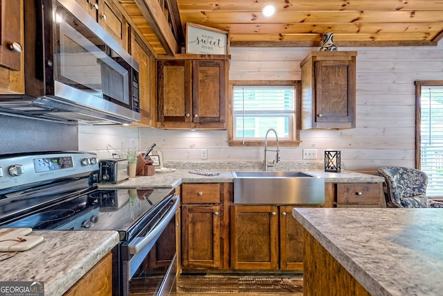 4960 Laurel Ldg, Clarkesville, GA 30523 - kitchen with stainless steel appliances, a sink, dark wood-type flooring, brown cabinets, and wooden ceiling