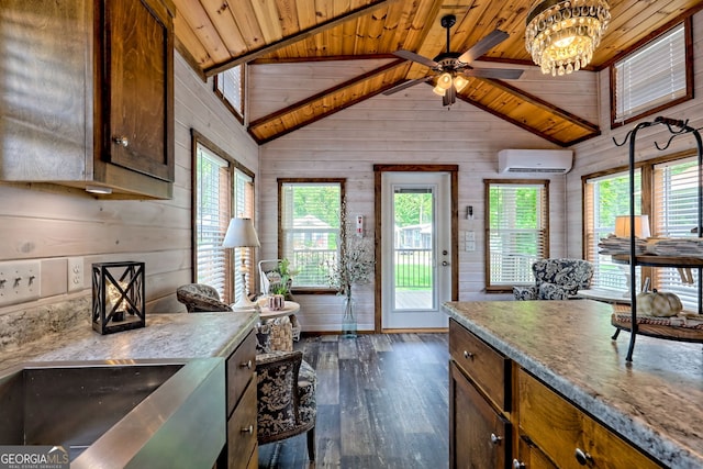 4960 Laurel Ldg, Clarkesville, GA 30523 - kitchen featuring wood walls, wood ceiling, dark wood finished floors, a wall mounted air conditioner, and a ceiling fan