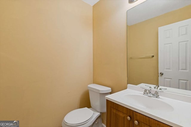 2907 Oakvale Falls Dr, Decatur, GA 30034 - bathroom featuring toilet, vanity, and baseboards