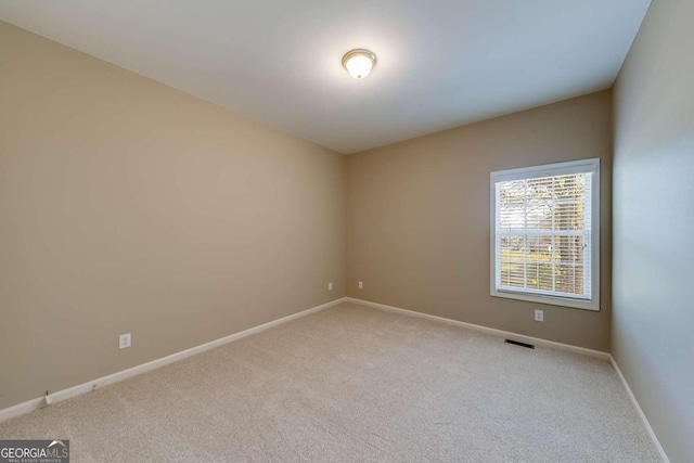 1151 Emperor Ln, Hoschton, GA 30548 - empty room featuring light carpet