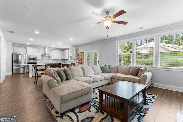 510 Cunninghame Ct, Peachtree City, GA 30269 - living area featuring a ceiling fan, recessed lighting, baseboards, dark wood-type flooring, and ornamental molding