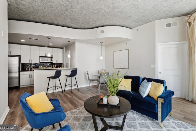 living area featuring wood finished floors