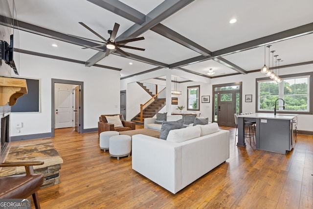 47 Wicklow Ct, Hoschton, GA 30548 - living room with wood-type flooring, stairway, beam ceiling, recessed lighting, and ceiling fan