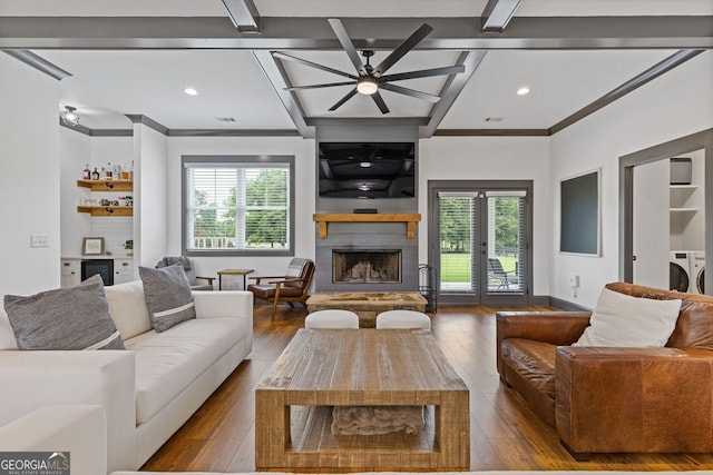 47 Wicklow Ct, Hoschton, GA 30548 - living room featuring coffered ceiling, independent washer and dryer, a fireplace, beverage cooler, and plenty of natural light