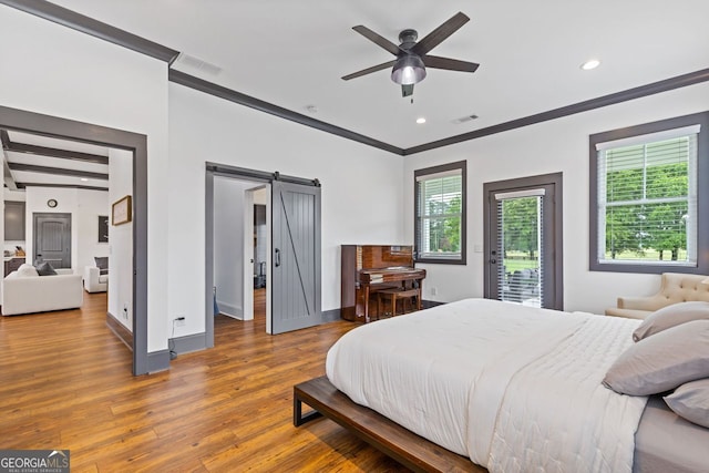 47 Wicklow Ct, Hoschton, GA 30548 - bedroom with access to outside, a barn door, multiple windows, wood finished floors, and ornamental molding