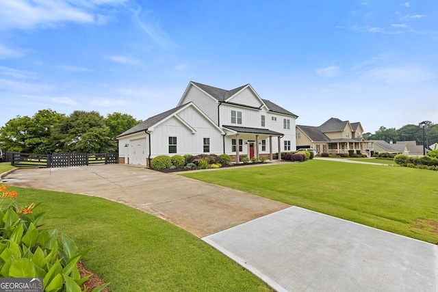 47 Wicklow Ct, Hoschton, GA 30548 - view of front facade with board and batten siding, concrete driveway, an attached garage, and covered porch