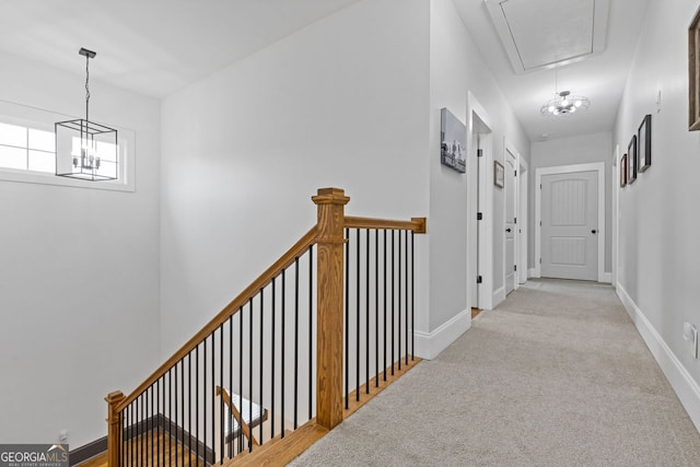 47 Wicklow Ct, Hoschton, GA 30548 - corridor featuring attic access, carpet, and an upstairs landing
