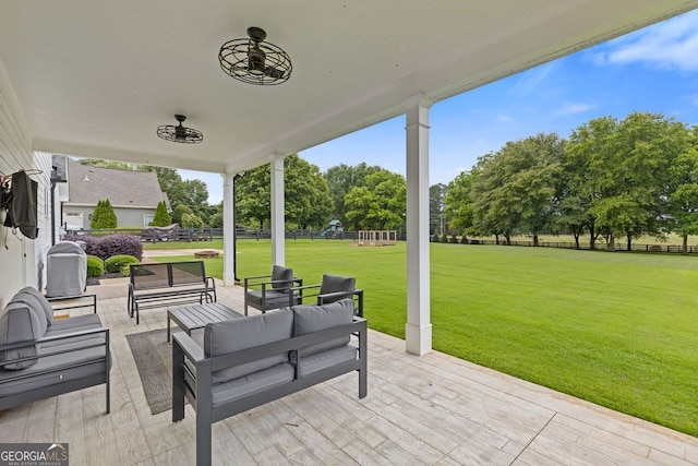 47 Wicklow Ct, Hoschton, GA 30548 - view of patio with an outdoor hangout area and view of scattered trees