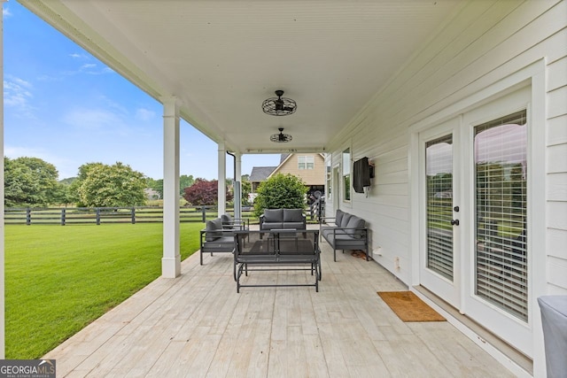47 Wicklow Ct, Hoschton, GA 30548 - wooden deck with an outdoor hangout area