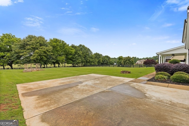 47 Wicklow Ct, Hoschton, GA 30548 - view of yard with an outdoor fire pit and a patio area