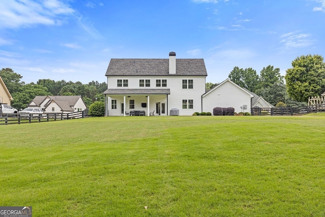 47 Wicklow Ct, Hoschton, GA 30548 - back of house with a chimney