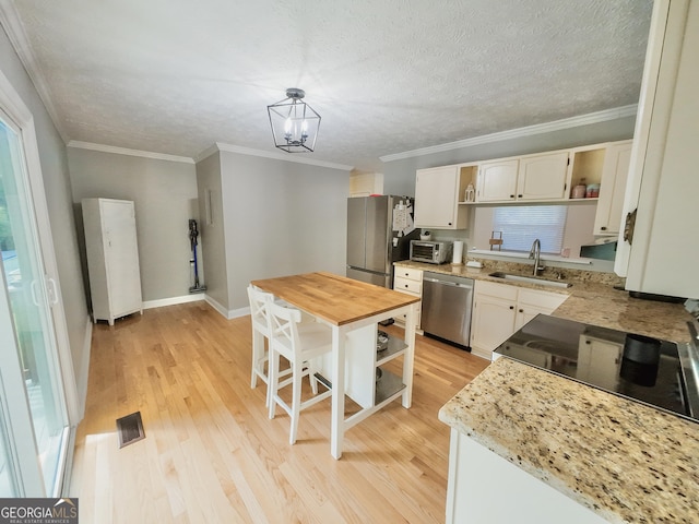 3905 Hunt Dr, Gainesville, GA 30507 - kitchen featuring open shelves, stainless steel appliances, wooden counters, light wood-type flooring, and crown molding