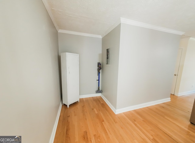 3905 Hunt Dr, Gainesville, GA 30507 - spare room featuring crown molding and light wood-type flooring