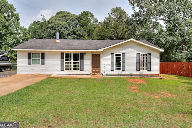 ranch-style house with concrete driveway