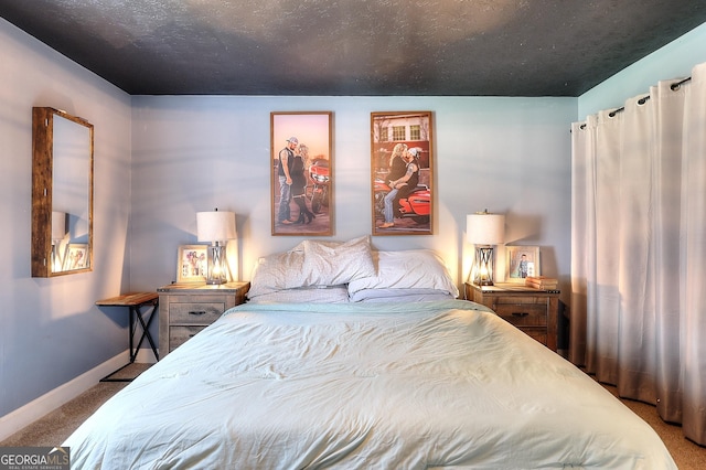 carpeted bedroom with baseboards