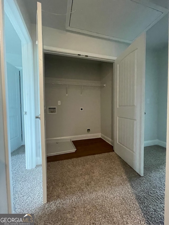 laundry area with attic access, electric dryer hookup, hookup for a washing machine, and baseboards