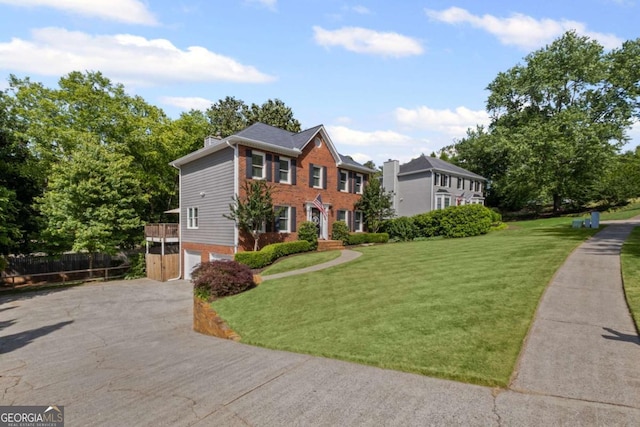 1811 Tilliewood Trl NE, Marietta, GA 30066 - view of front of home featuring brick siding, an attached garage, and driveway