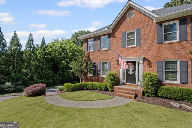1811 Tilliewood Trl NE, Marietta, GA 30066 - view of front of home with brick siding and a front lawn