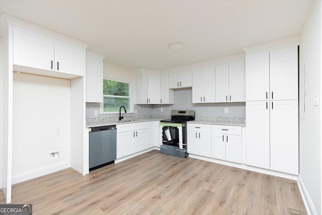 kitchen with stainless steel appliances, light wood-style flooring, baseboards, and white cabinets
