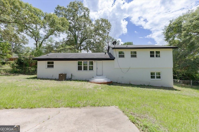 back of house with brick siding