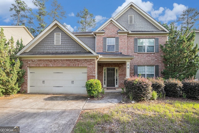 4889 Arbor View Pkwy NW, Acworth, GA 30101 - craftsman-style home with driveway, brick siding, and an attached garage