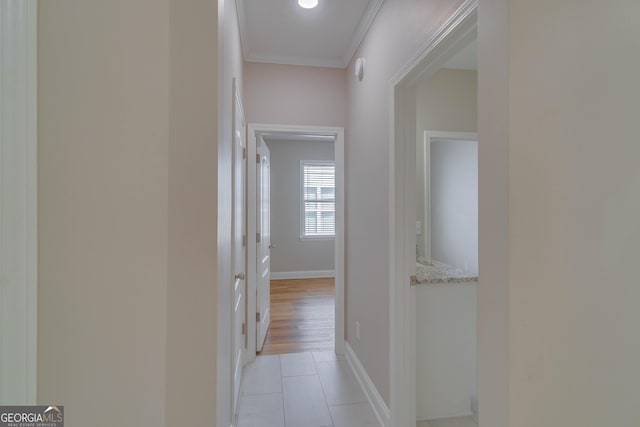 351 Chandler Bluff Ct, Grayson, GA 30017 - hall featuring light tile patterned floors, crown molding, and baseboards