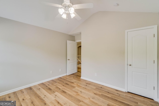 351 Chandler Bluff Ct, Grayson, GA 30017 - unfurnished bedroom featuring baseboards, wood finished floors, high vaulted ceiling, and ceiling fan