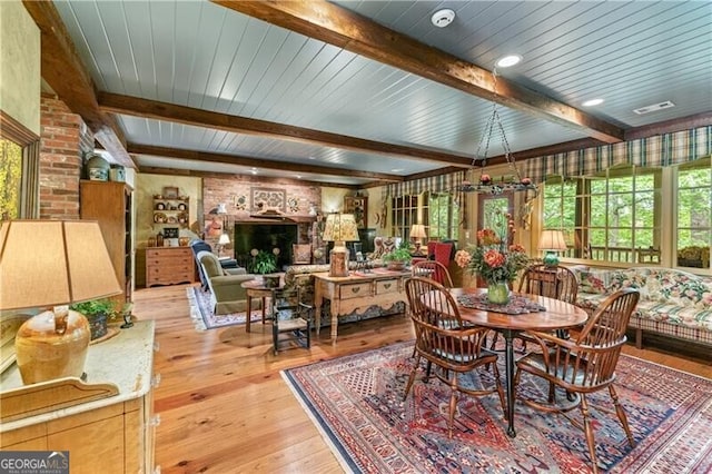 5945 W Andechs Smt, Johns Creek, GA 30097 - dining space featuring beamed ceiling and light wood-style flooring