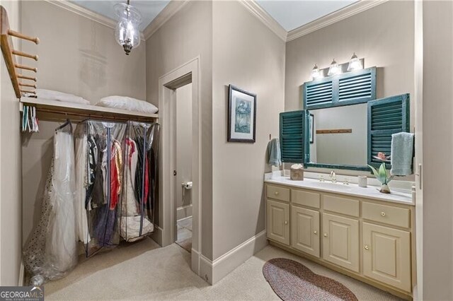 5945 W Andechs Smt, Johns Creek, GA 30097 - bathroom with crown molding, vanity, and baseboards