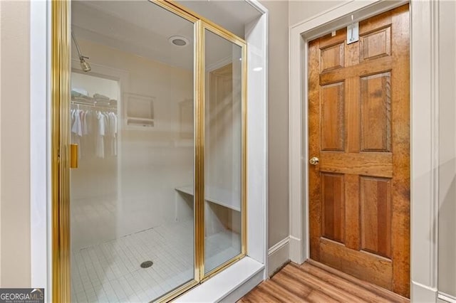 5945 W Andechs Smt, Johns Creek, GA 30097 - bathroom featuring wood finished floors