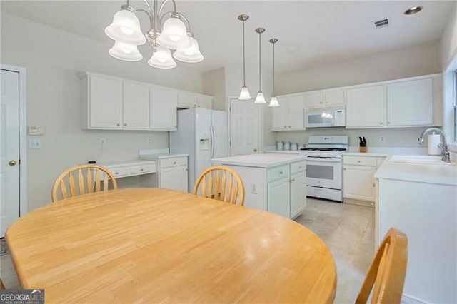 4321 Sugar Maple Chase NW, Acworth, GA 30101 - kitchen featuring white appliances, a sink, a chandelier, and white cabinets